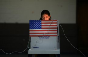 A Sun Valley resident votes at the polling station located at Our Lady of The Holy Church on election day at the Sun Valley's Latino district, Los Angeles County, on Nov. 6, 2012 in Calif.