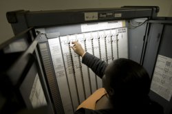 A voter votes in the 2008 US general election at a voting site on Frederick Douglass boulevard in Harlem, New York, NY, United States, 4 November 2008.