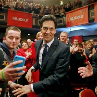 Image: Britain's opposition Labour Party leader Ed Miliband arrives at an election campaign event in Warrington, north west England