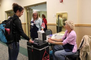 Rachel Strauss, junior health and exercise science major, turns in her ballot in the North Ballroom of the Lory Student Center on Tuesday afternoon. The ballots will be in the LSC until November 4th. (Photo credit: Chrissy Vessa)