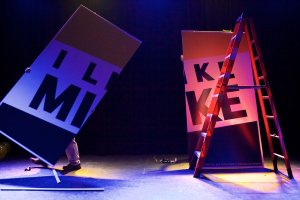 Workers remove the giant &quotI Like Mike" sign from the Portland stage where Democratic gubernatorial candidate Mike Michaud conceded the governor's race the morning after Election Day 2014.